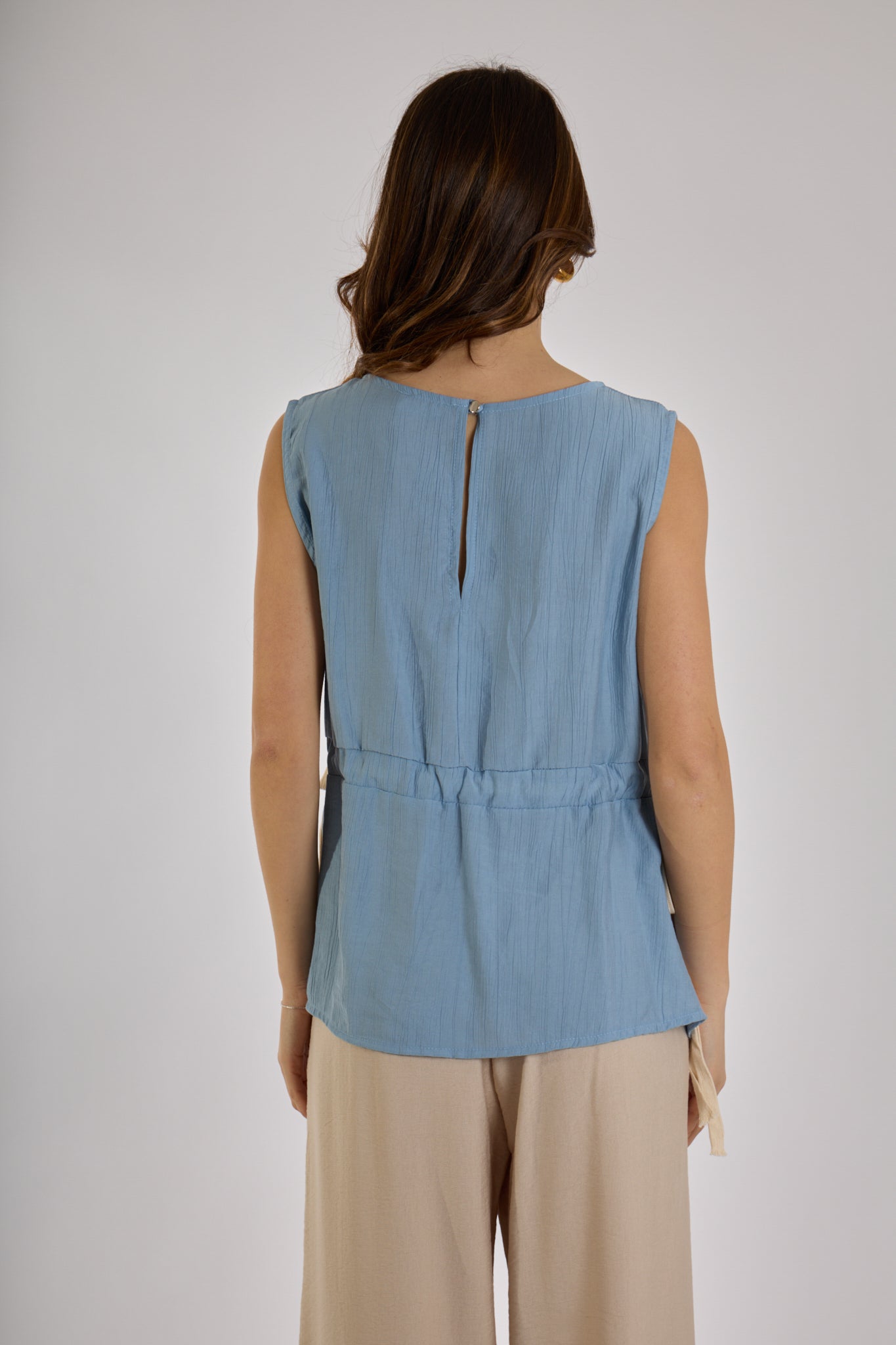 TOP FIOCCHI LATERALI|Colore:Celeste